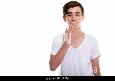 Studio shot di giovani persiano bello ragazzo adolescente cercando shocke Foto Stock