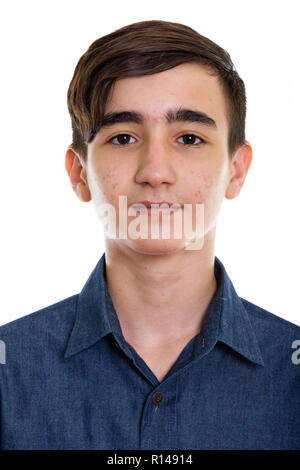 Studio shot del volto del giovane persiano bello ragazzo adolescente Foto Stock