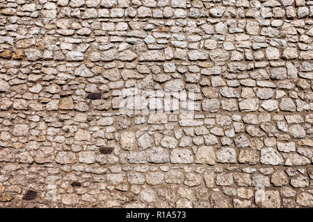 Castello medievale con mura in pietra di sfondo o la texture dal castello di Wawel a Cracovia, Polonia. Foto Stock