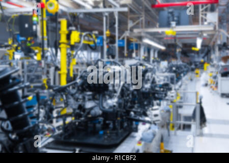 Sfondo sfocato le parti interne della macchina. Immagine sfocati di auto sospensione. Auto sfondo in fabbrica Foto Stock