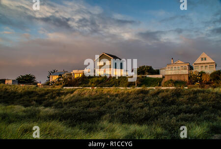 Case sulla spiaggia a Anderby creek,Lincolnshire Foto Stock