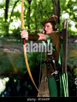 Le avventure di Robin Hood è un 1938 American Technicolor swashbuckler film dalla Warner Bros, prodotta da Hal B. Wallis e Henry Blanke, diretto da Michael Curtiz e William Keighley, che stelle Errol Flynn, Olivia de Havilland, Basil Rathbone e Claude Rains. Credito: Hollywood Archivio foto / MediaPunch Foto Stock