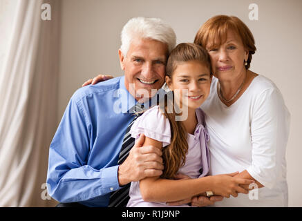 Ritratto di un imprenditore, con sua moglie e sua figlia. Foto Stock