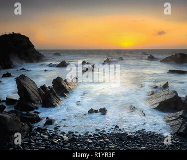 Tramonto Da Hartland Quay in North Devon. Foto Stock
