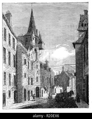 La Canongate Tolbooth fu costruito nel 1591 e avrebbe costituito il mozzo locale per la Canongate burgh, insieme con il vicino Mercat Cross dove i commercianti soddisfatti e hanno condotto il loro business. Il Tolbooth avrebbe avuto molte funzioni, che serve come courthouse, burgh carcere e luogo di riunione del consiglio comunale. L'edificio è stato costruito per Sir Lewis Bellenden, la giustizia-impiegato per la burgh, e le sue iniziali può ancora essere visto oltre il portone di Tolbooth Wynd. Edimburgo, Scozia Foto Stock