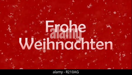 Merry Christmas testo in tedesco 'Frohe Weihnachten' su sfondo rosso Foto Stock