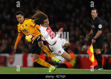 Matteo Guendouzi di Arsenal è imbrattata di Helder Costa di Wolverhampton Wanderers - Arsenal v Wolverhampton Wanderers, Premier League, Emirates Stadium Foto Stock