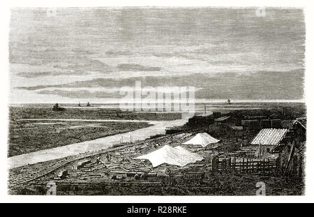 Vecchio vista Port-Said: Canale di Suez sito in costruzione vicino al Lago Manzala, Egitto. Di Grenet, publ. in Le Tour du Monde, Parigi, 1863 Foto Stock