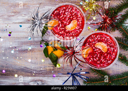 Pomegranage e tangerine martini Foto Stock