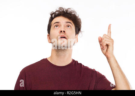 Allegro giovane uomo cerca su ritratto Foto Stock