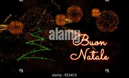Merry Christmas testo in italiano "Buon Natale" su albero di pino con particelle di spumante e fuochi d'artificio su uno sfondo innevato Foto Stock