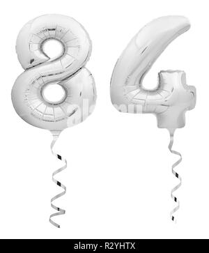 Silver Chrome numero ottantaquattro 84 fatta di palloncino gonfiabile con nastro su bianco Foto Stock