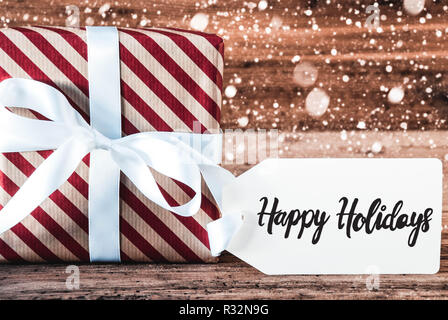 Regalo di natale, inglese Calligraphy vacanze felici, fiocchi di neve Foto Stock