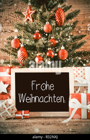 Struttura ad albero verticale, doni, Calligrafia Frohe Weihnachten significa Buon Natale Foto Stock