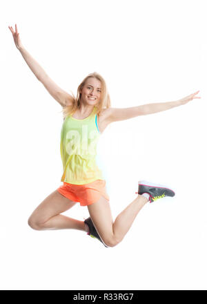 La bionda atleta fa un salto di gioia Foto Stock