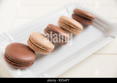 Macarons al cioccolato Foto Stock