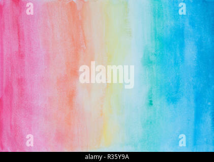 Abstract dipinte a mano sfondo ad acquerello in arcobaleno di colori con macchie di acquerello e trama della carta. Foto Stock