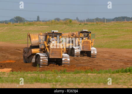 R motore fatturazioni raschiatori lavorando sulla costruzione di IPORT a Doncaster,South Yorkshire Foto Stock