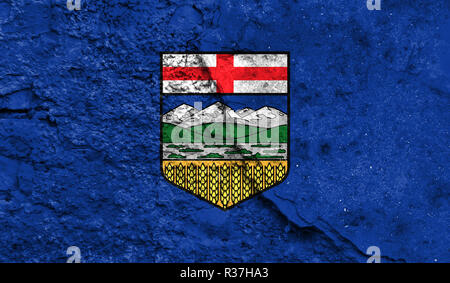Bandiera di Alberta close up dipinta su un muro incrinato, concetto di azioni armate e conflitti in tutto il mondo Foto Stock
