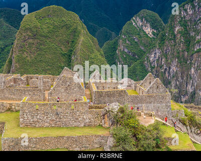 Tipiche costruzioni in Machu Picchu cittadella Foto Stock