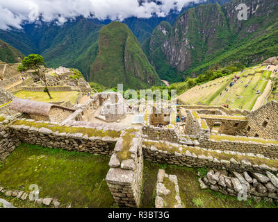 Tipiche costruzioni in Machu Picchu cittadella Foto Stock