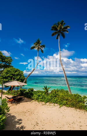 Anse Forbons spiaggia presso l'Hilton Doubletree Resort e Spa, Mahe, Repubblica delle Seicelle, Oceano Indiano. Foto Stock
