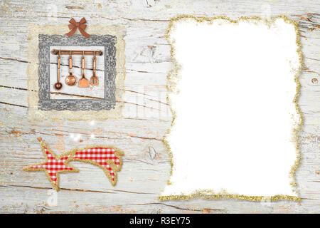 Cena di Natale sfondo menu.Stella di Betlemme e carino utensili da cucina con una carta bianca per scrittura o menu ricette Foto Stock