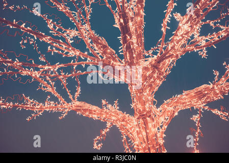 Luci oro albero di Natale Foto Stock