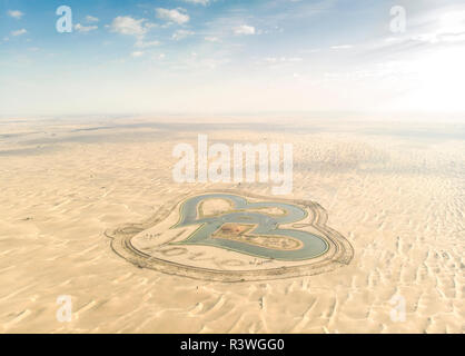 L'uomo fatto Al Qudra ama il lago in un deserto vicino a Dubai Foto Stock