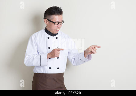 Coppia asiatica chef cinese rivolta Foto Stock