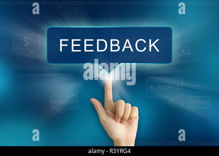Mano facendo clic sul pulsante feedback Foto Stock