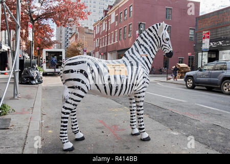 Una zebra per la vendita in ottava strada nel Greenwich Village, Manhattan, New York City. Foto Stock