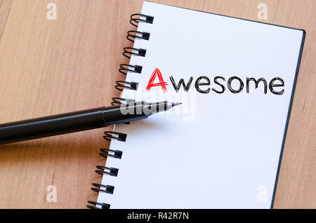 Awesome scrivere su notebook Foto Stock