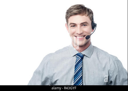 Giovani dipendente assistendo il cliente su chiamata Foto Stock