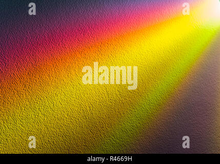 Sullo sfondo di un multi-raggi colorati emanano dall'angolo superiore destro Foto Stock
