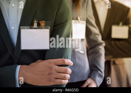 Closeup.gruppo di gente di affari con i badge di vuoto Foto Stock