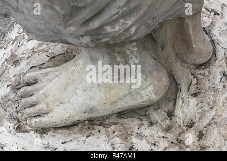 Ai piedi di Cristo Foto Stock