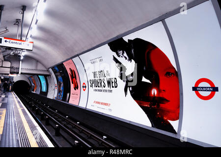 48 fogli per la pubblicità tramite Affissioni film di nuovo accanto a brani sulla metropolitana di Londra via metropolitana Foto Stock
