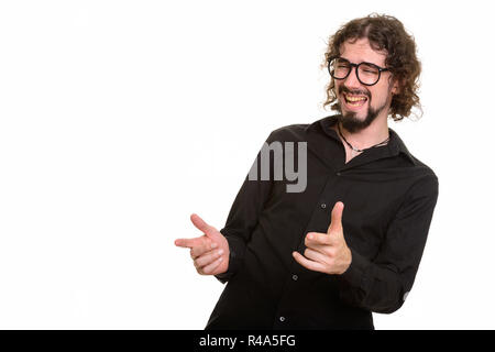 Felice uomo caucasico ridendo e puntamento entrambe le dita Foto Stock