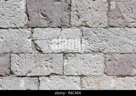 Muratura in pietra realizzate da bianco-rosa calcare Foto Stock