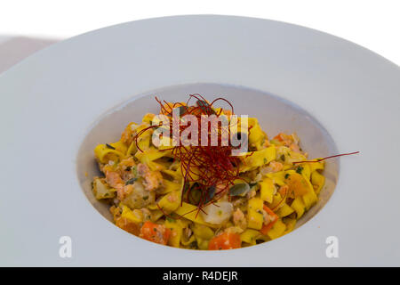 Piatto di pasta a base di pesce Foto Stock