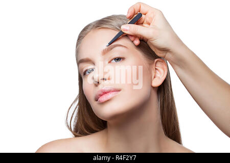 La donna la correzione delle sopracciglia forma Foto Stock