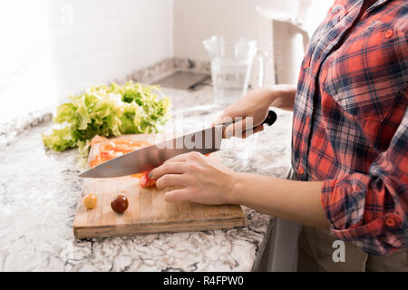 Donna Insalata di taglio Foto Stock