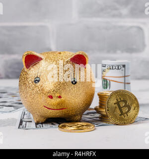 Bitcoins, valuta e salvadanaio Foto Stock