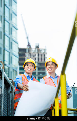 Indonesia asia lavoratori edili sul sito di costruzione Foto Stock