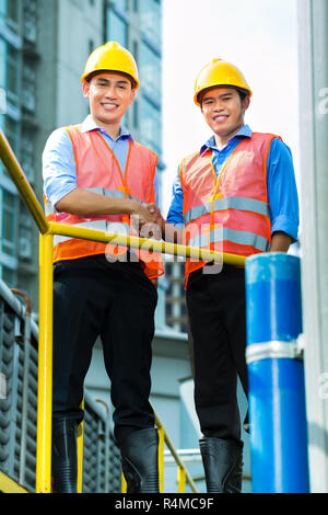 Indonesia asia lavoratori edili sul sito di costruzione Foto Stock