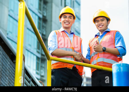 Indonesia asia lavoratori edili sul sito di costruzione Foto Stock