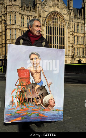 Kaya Mar - Fumettista politico - con uno dei suoi dipinti Brexit Philip Hammond con un bilancio scatola piena di carote e Theresa Maggio, naufragio Foto Stock