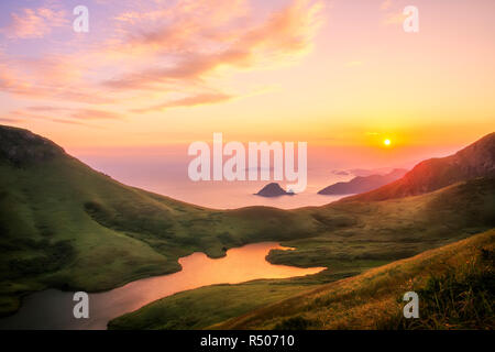 Il sole al tramonto Foto Stock