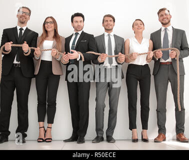 I colleghi con polsi legato con una corda Foto Stock